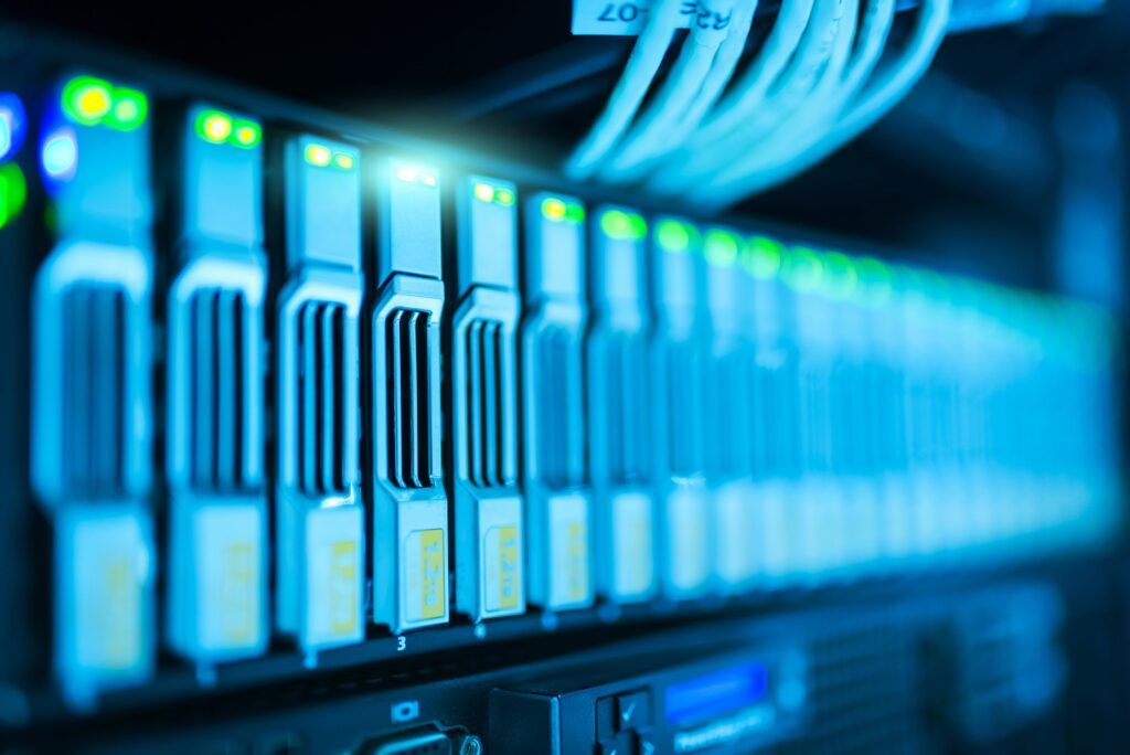 Close-up of a glowing server rig, symbolizing the rise of machine-generated creativity amid the AI art controversy.